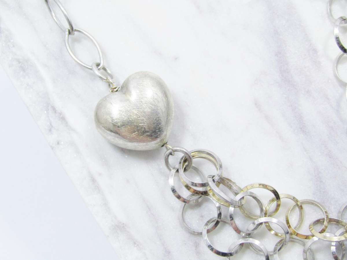 A Beautiful Puffy Heart Necklace Made up in Circles in Sterling Silver.
