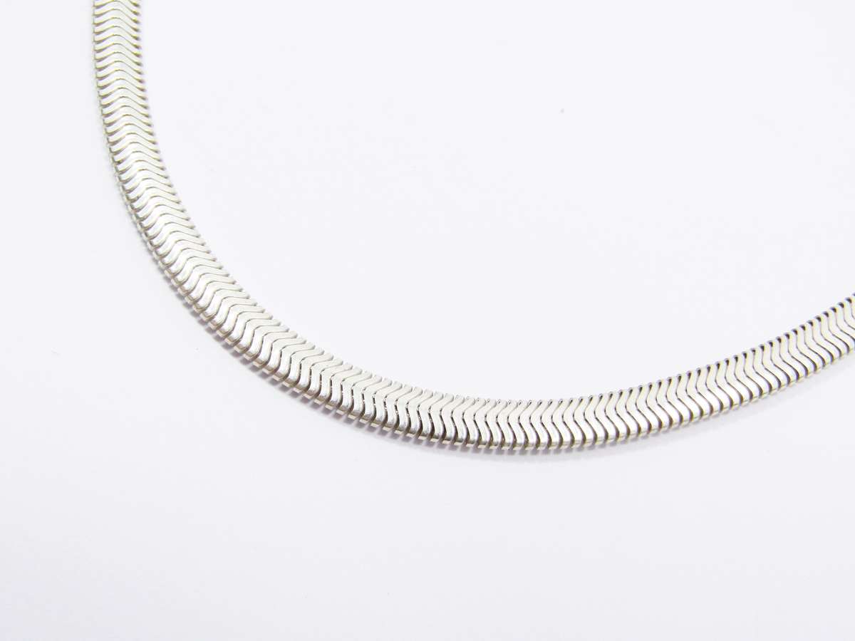A Lovely Broad Flat Snake Chain in Sterling  Silver.