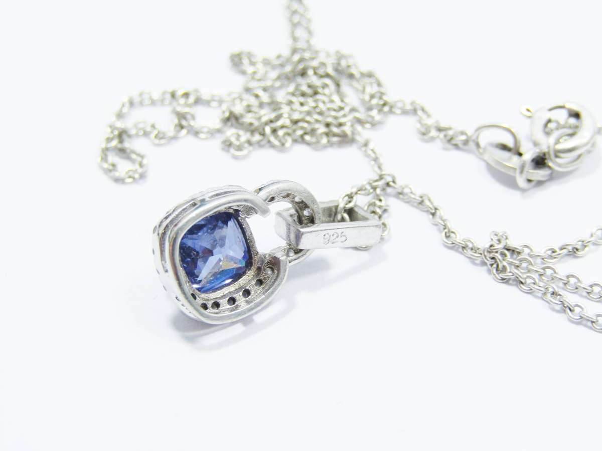 A Lovely Blue Zirconia Halo Design Pendant on Chain in Sterling Silver