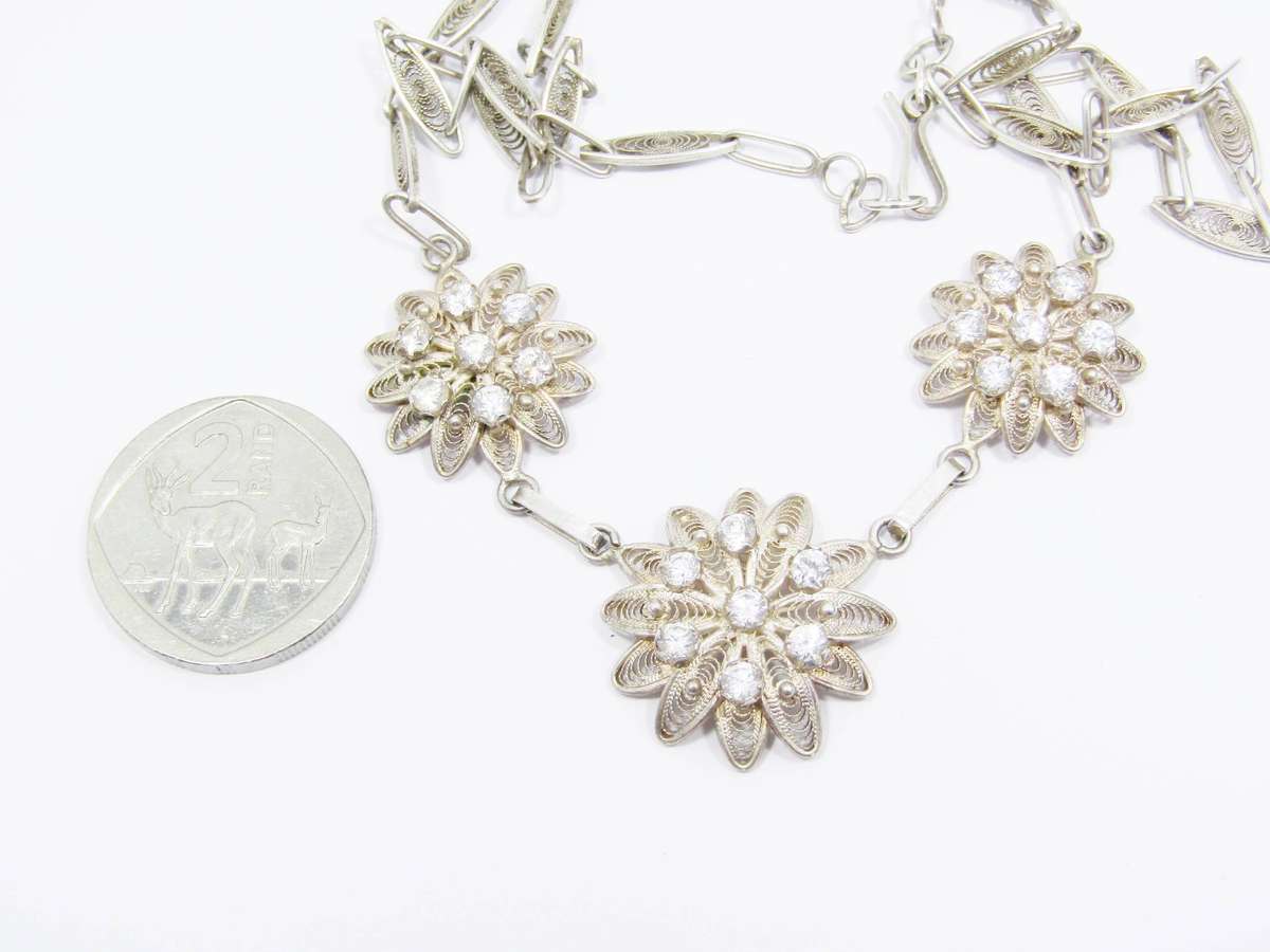 A Lovely Filigree Flower Necklace Set with Tiny Clear Sones in 800 Silver