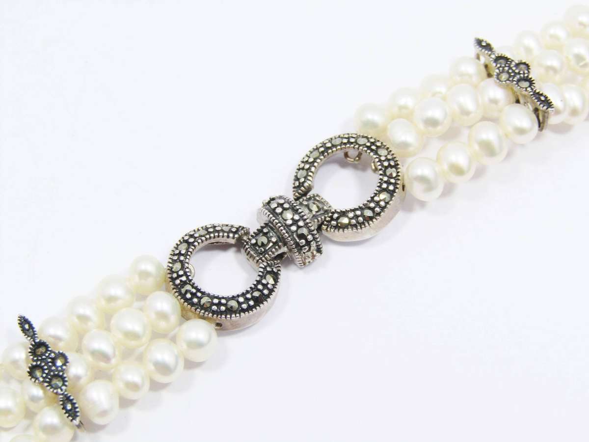 A Beautiful Multi Strand Fresh Water Pearl and Marcasite Bracelet in Sterling Silver