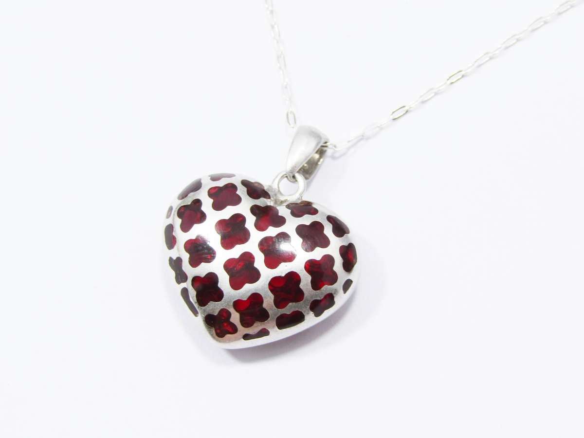 A Stunning Cherry Resin Heart Pendant on Chain in Sterling Silver.