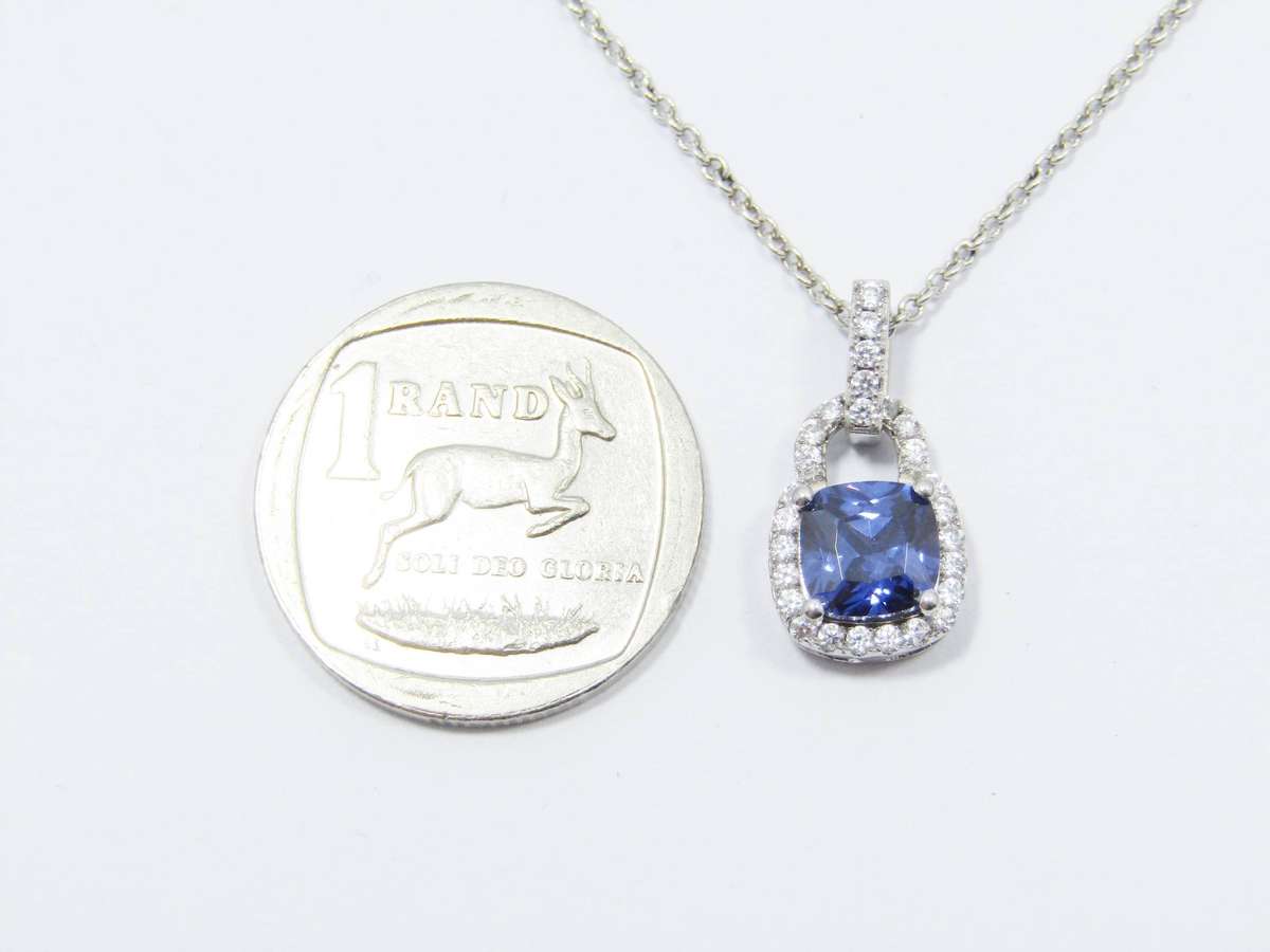 A Lovely Blue Zirconia Halo Design Pendant on Chain in Sterling Silver