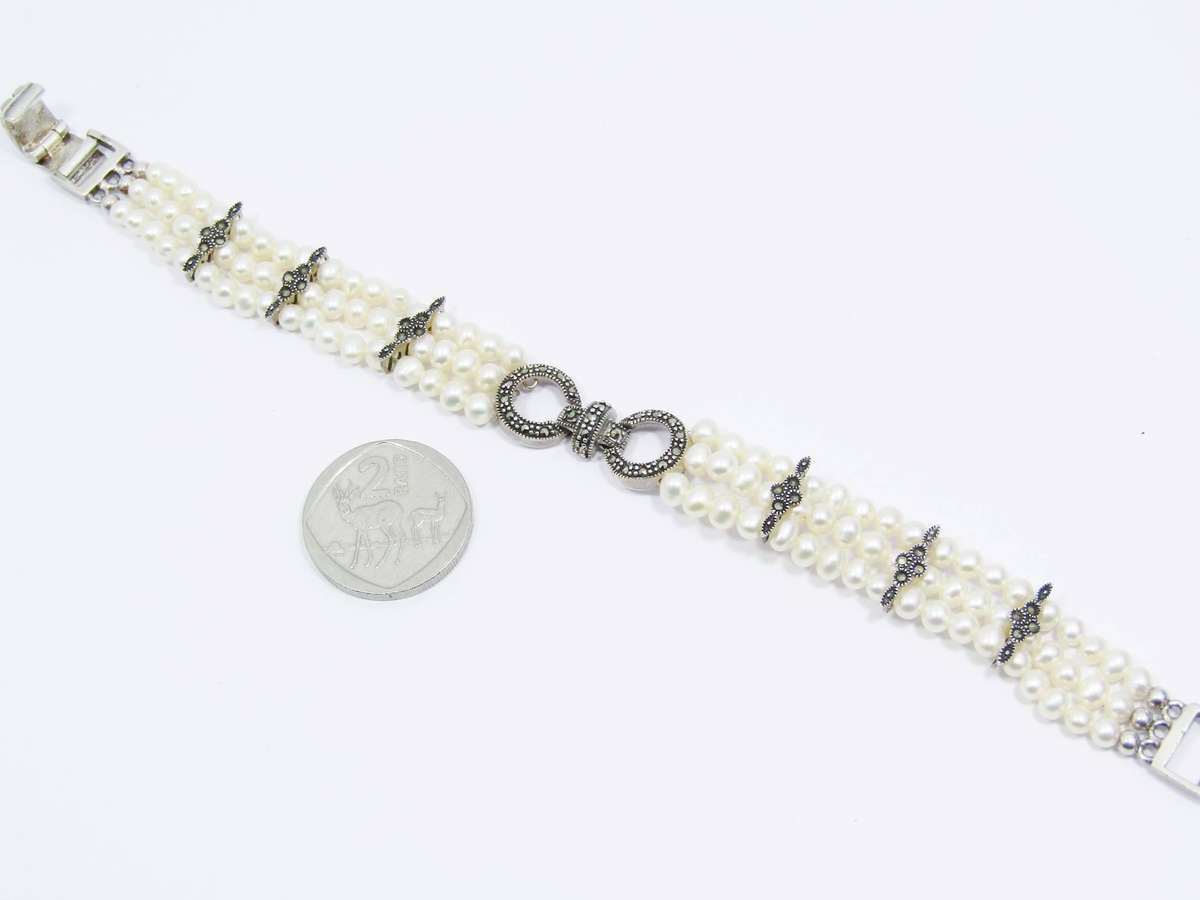 A Beautiful Multi Strand Fresh Water Pearl and Marcasite Bracelet in Sterling Silver
