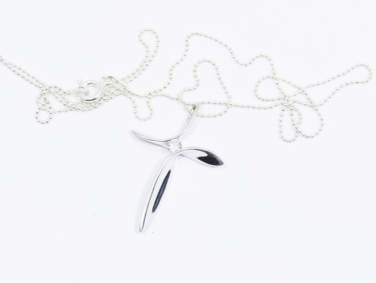 A Beautiful Abstract Design Cross with  a Tiny Zirconia on Chain in Sterling Silver