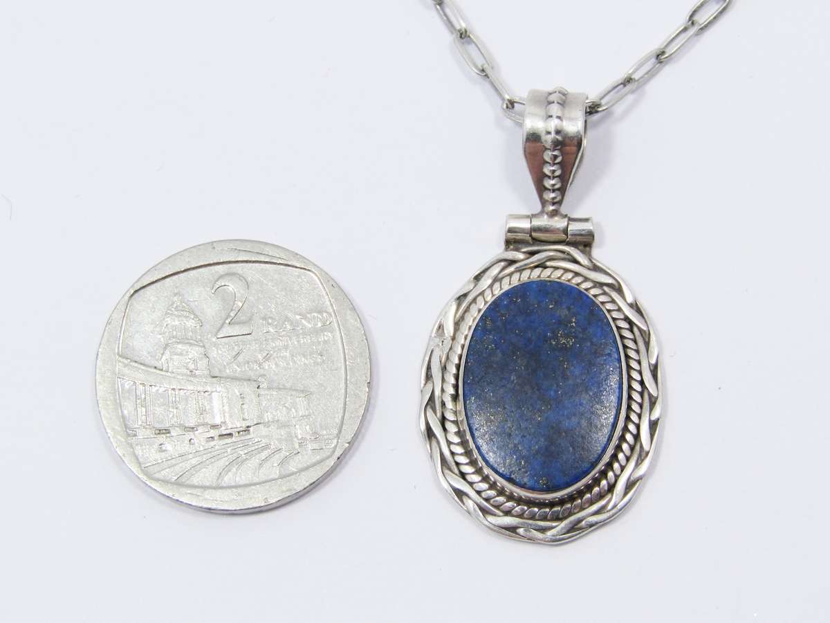 A Lovely Medium size Lapis Lazuli Pendant on Chain In Sterling Silver.