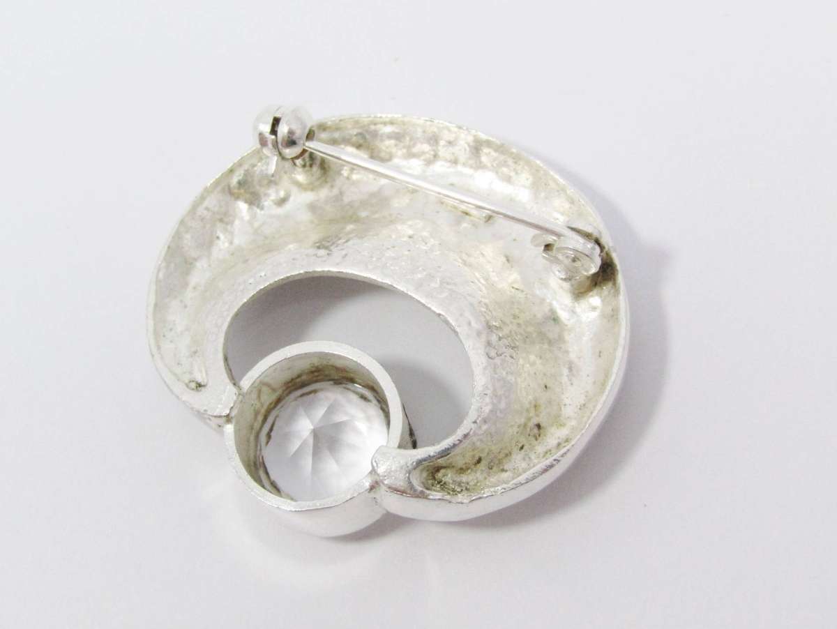 A Lovely Solid Modernist Style Brooch With a Rock Crystal in Silver.