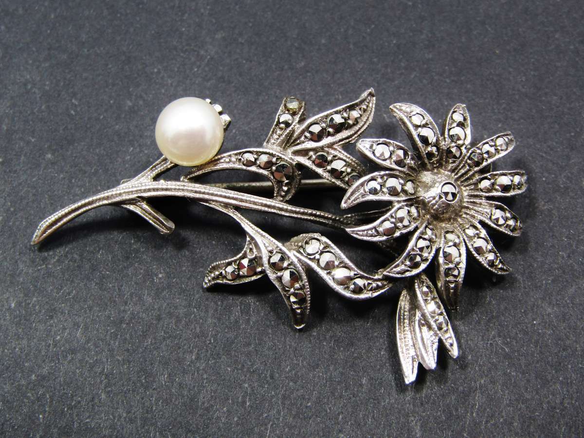 A Gorgeous Vintage Marcasite And Pearl brooch in Sterling Silver.