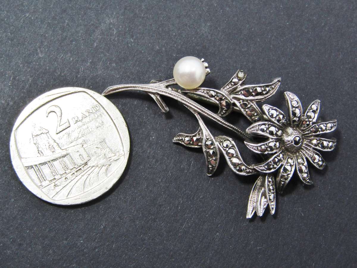 A Gorgeous Vintage Marcasite And Pearl brooch in Sterling Silver.