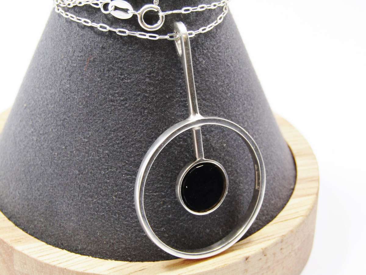 A Lovely Modernist Design Pendant With a Black inlay on Chain in Sterling Silve