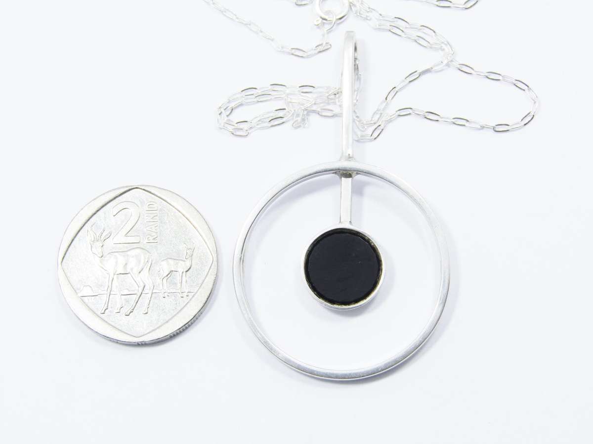 A Lovely Modernist Design Pendant With a Black inlay on Chain in Sterling Silve