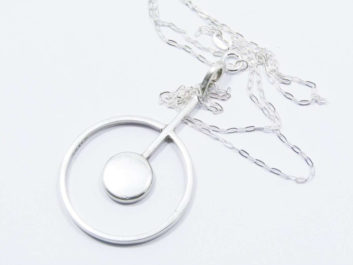 A Lovely Modernist Design Pendant With a Black inlay on Chain in Sterling Silve