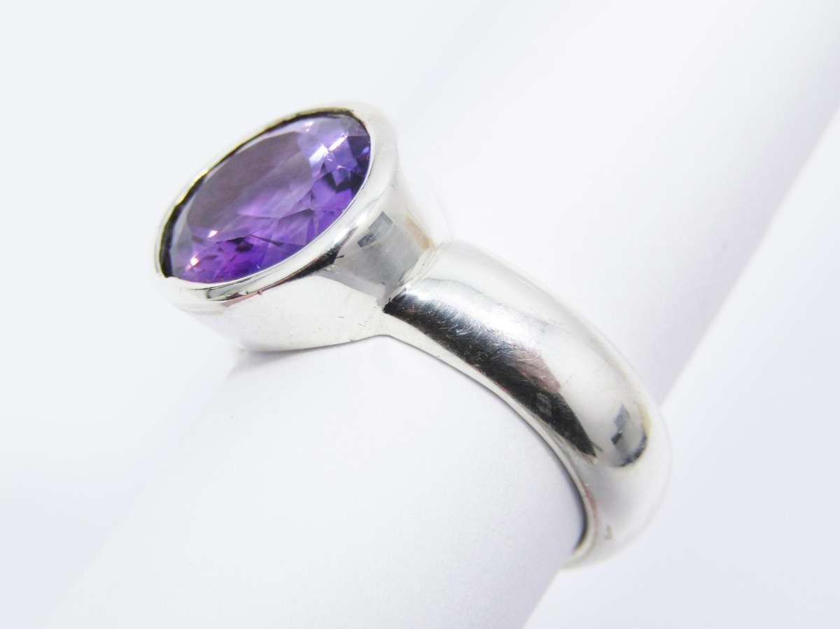 A Lovely Solid Amethyst Ring in Sterling Silver.
