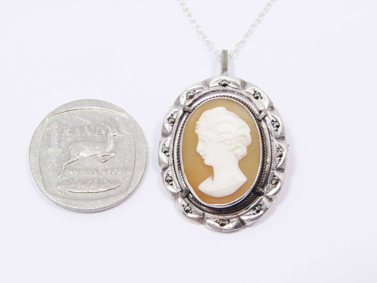 A Lovely Vintage Carved Cameo Brooch/ Pendant On Chain in Sterling Silver.