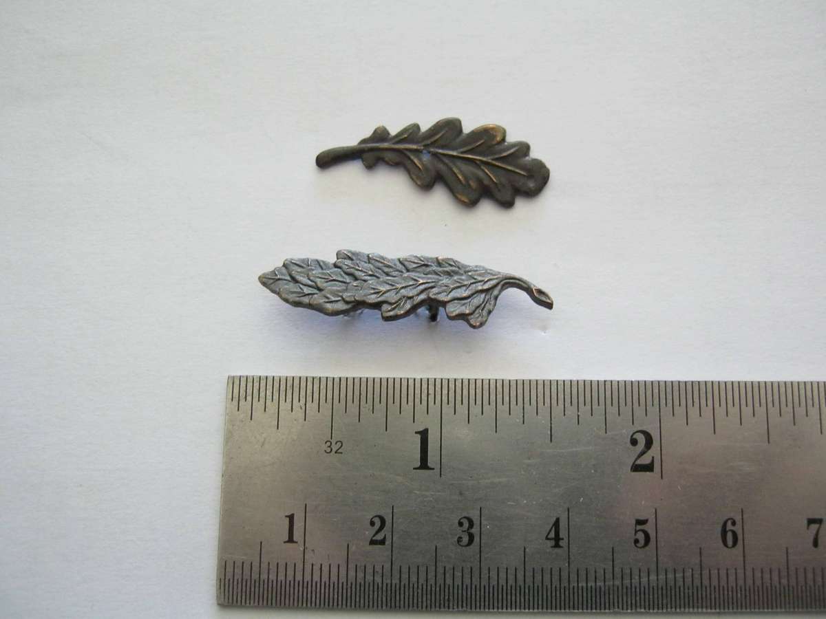 Full size WW1 and WW2 M.I.D. Emblems.