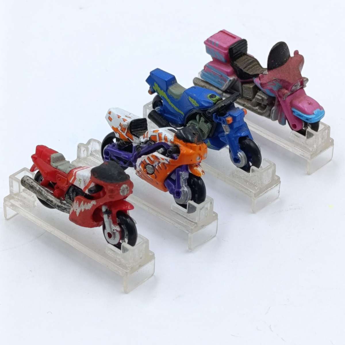 Lot of 4 Vintage Galoob Micro Machines motorcycles with stands