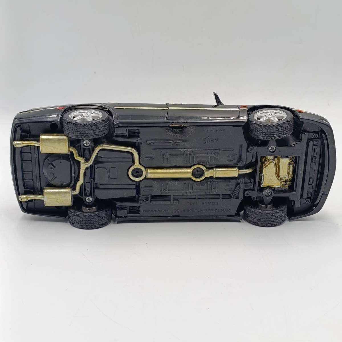 Maisto 2004 Chevrolet Impala SS die-cast model car - some chassis damage - scale 1/18