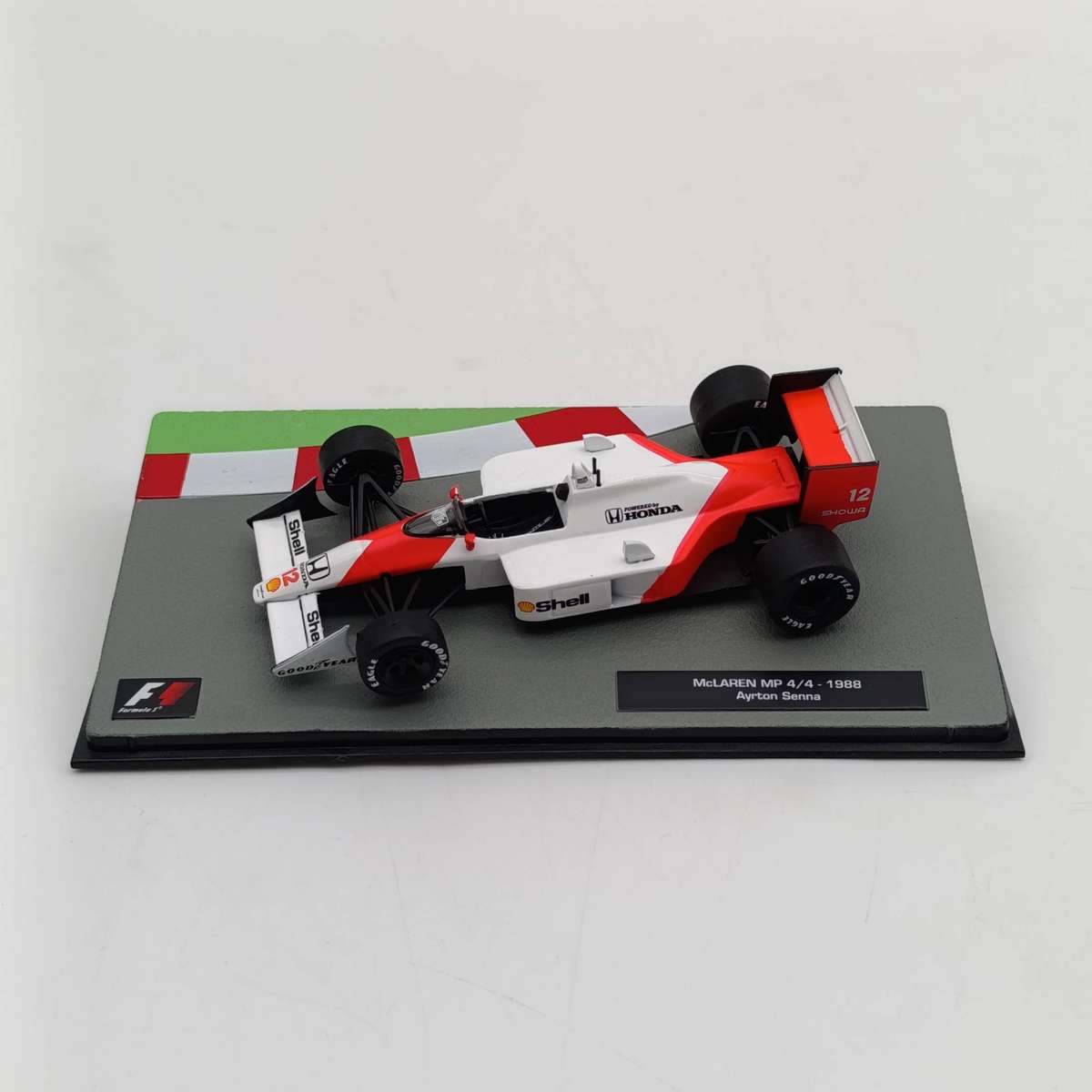 Formula 1 McLaren Mp 4/4 1988 die-cast model car in box - #12 Ayrton Senna