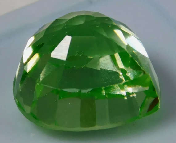 14.5 Ct Apple Green Peridot. Pear Cut gemstone
