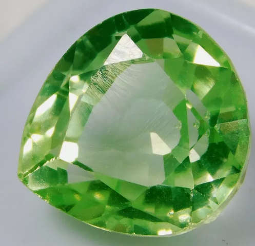 14.5 Ct Apple Green Peridot. Pear Cut gemstone