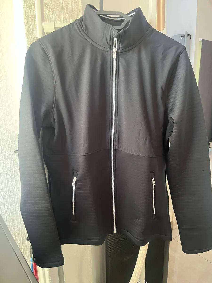 Brand new ladies Under Armour golf storm jacket