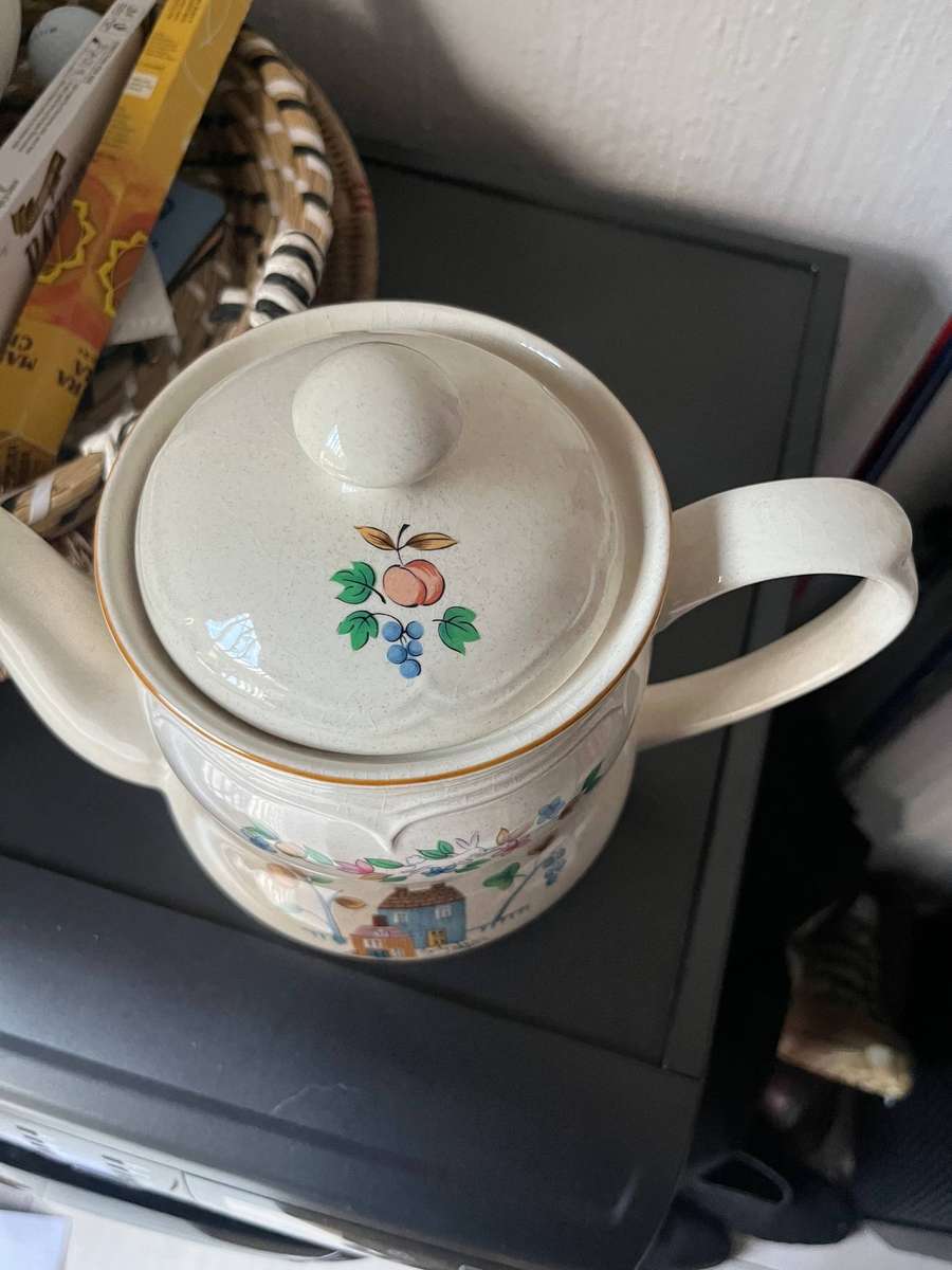 Vintage heartland stoneware teapot