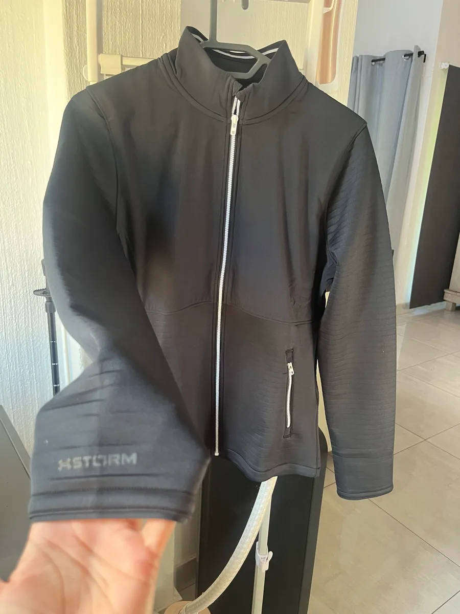 Brand new ladies Under Armour golf storm jacket