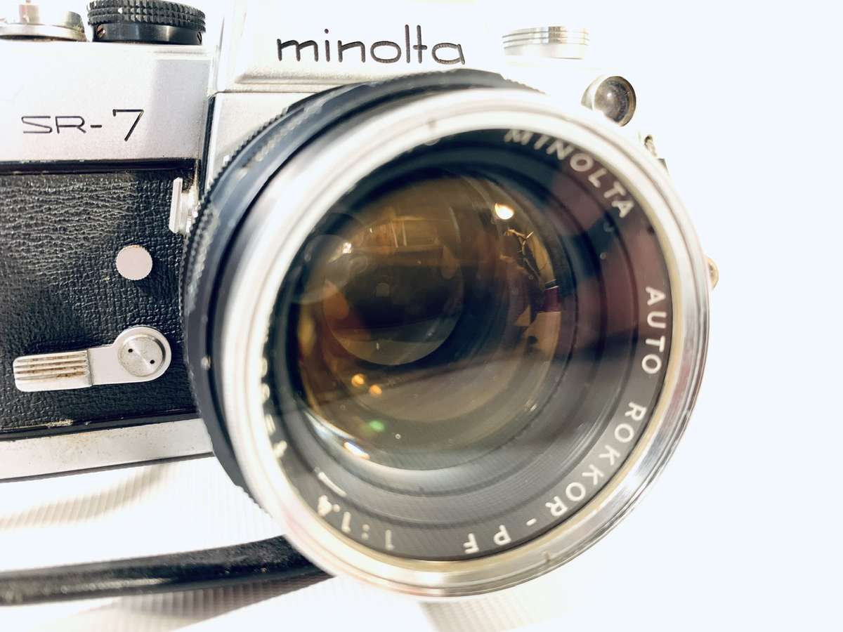 Vintage Minolta SR-7 SLR 35mm Film Camera with Accessories and Protective Case