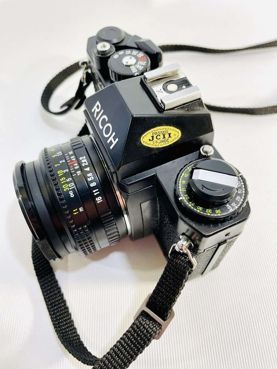 2 x Ricoh SLR 35mm Film Cameras with Accessories