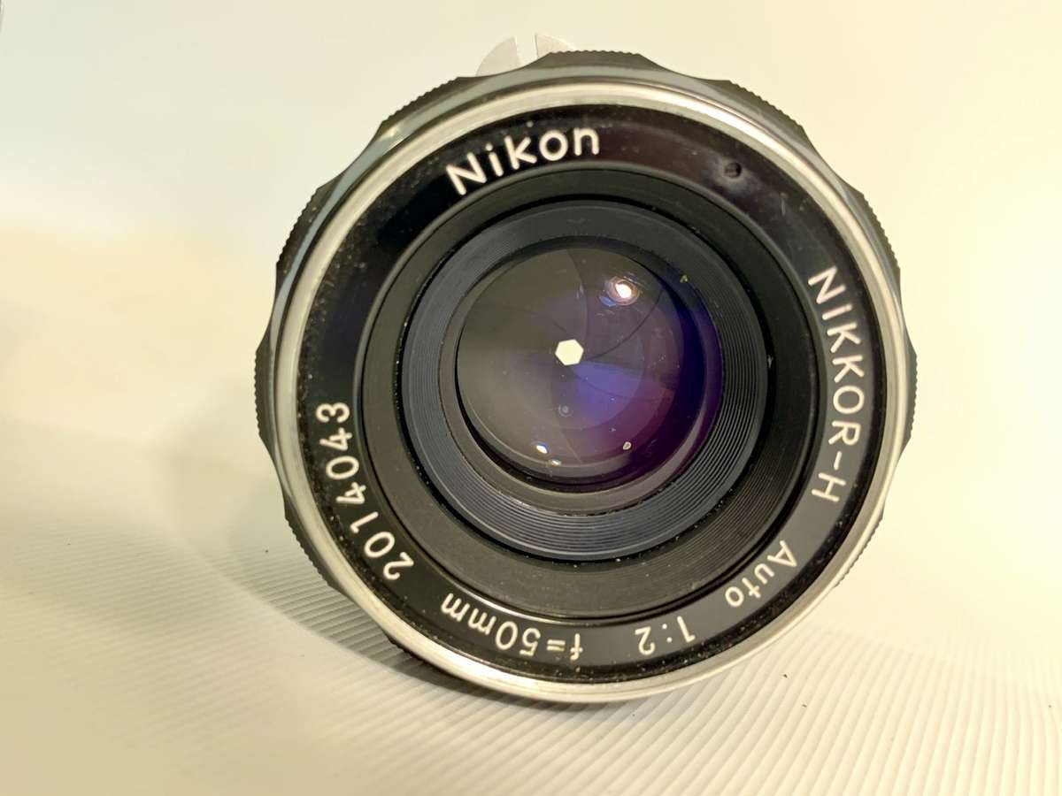 Nikon Nikkormat F1 SLR 35mm Film Camera with Nikkor-H Auto 1:2 50mm Lens