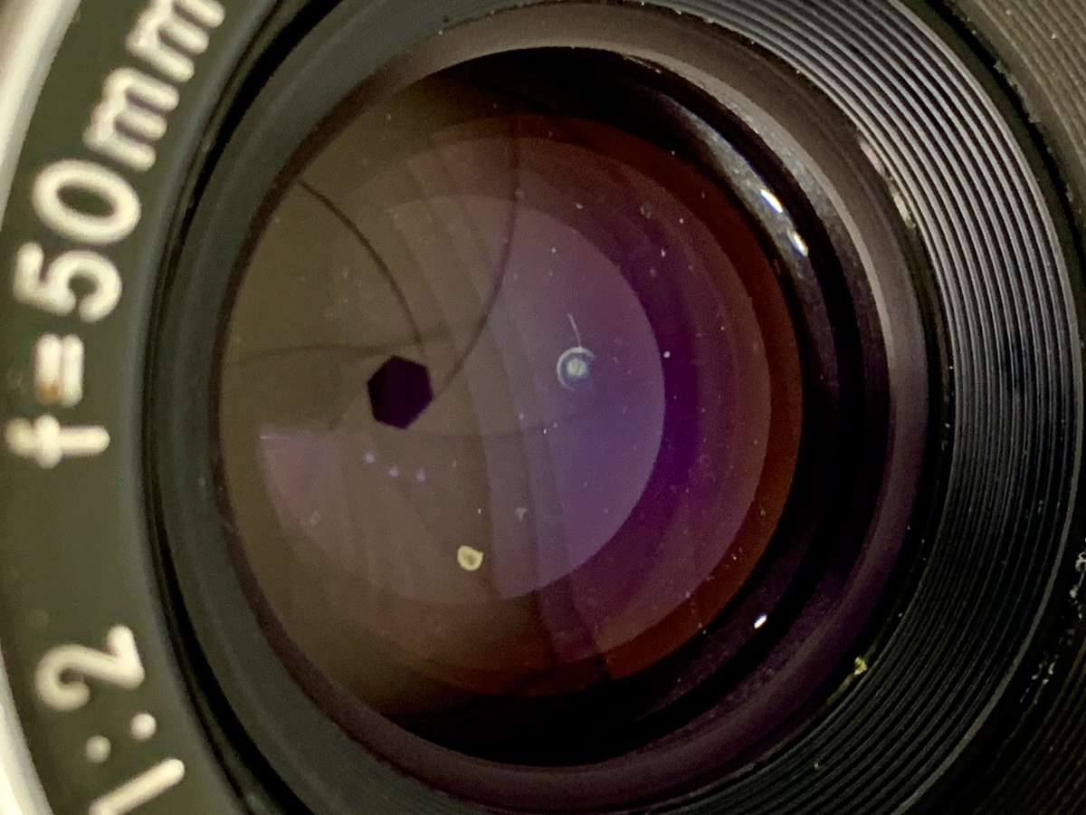 Nikon Nikkormat F1 SLR 35mm Film Camera with Nikkor-H Auto 1:2 50mm Lens