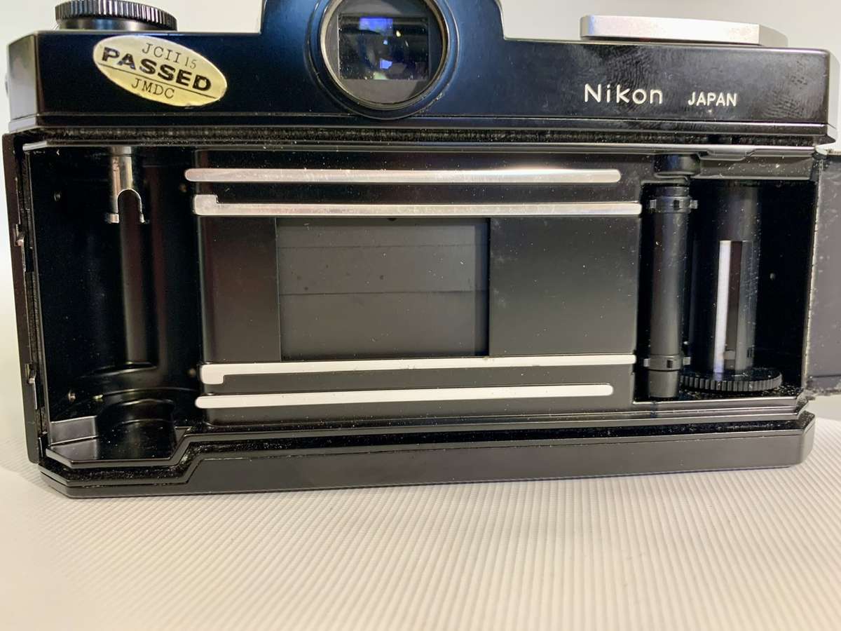 Nikon Nikkormat F1 SLR 35mm Film Camera with Nikkor-H Auto 1:2 50mm Lens