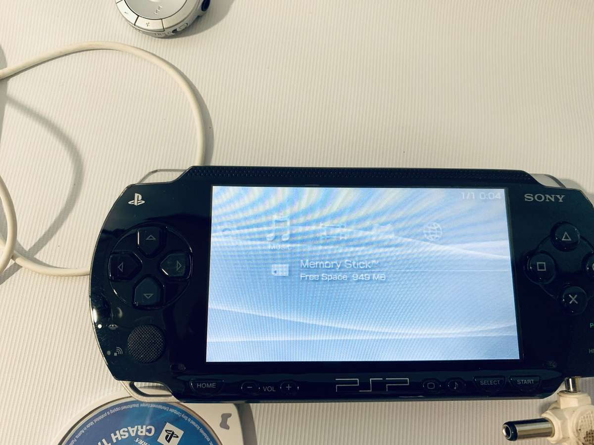 PSP 1004 (Works, but needs charger and battery)