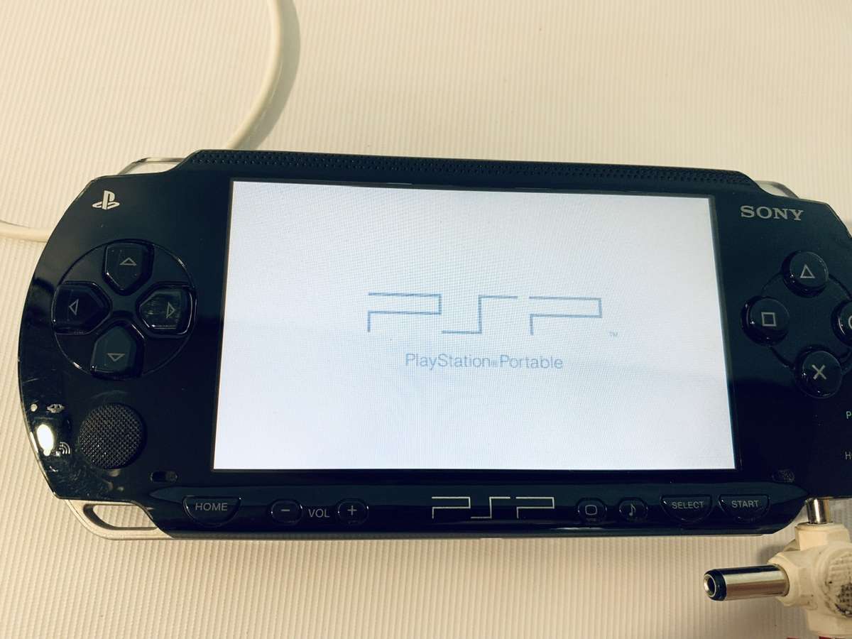 PSP 1004 (Works, but needs charger and battery)