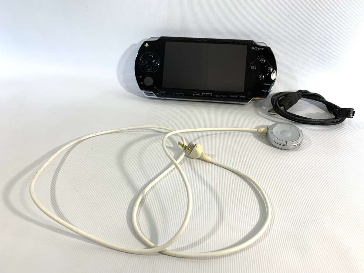PSP 1004 (Works, but needs charger and battery)