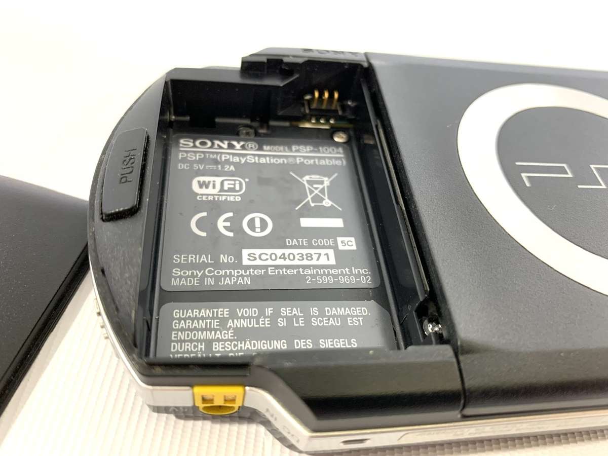 PSP 1004 (Works, but needs charger and battery)