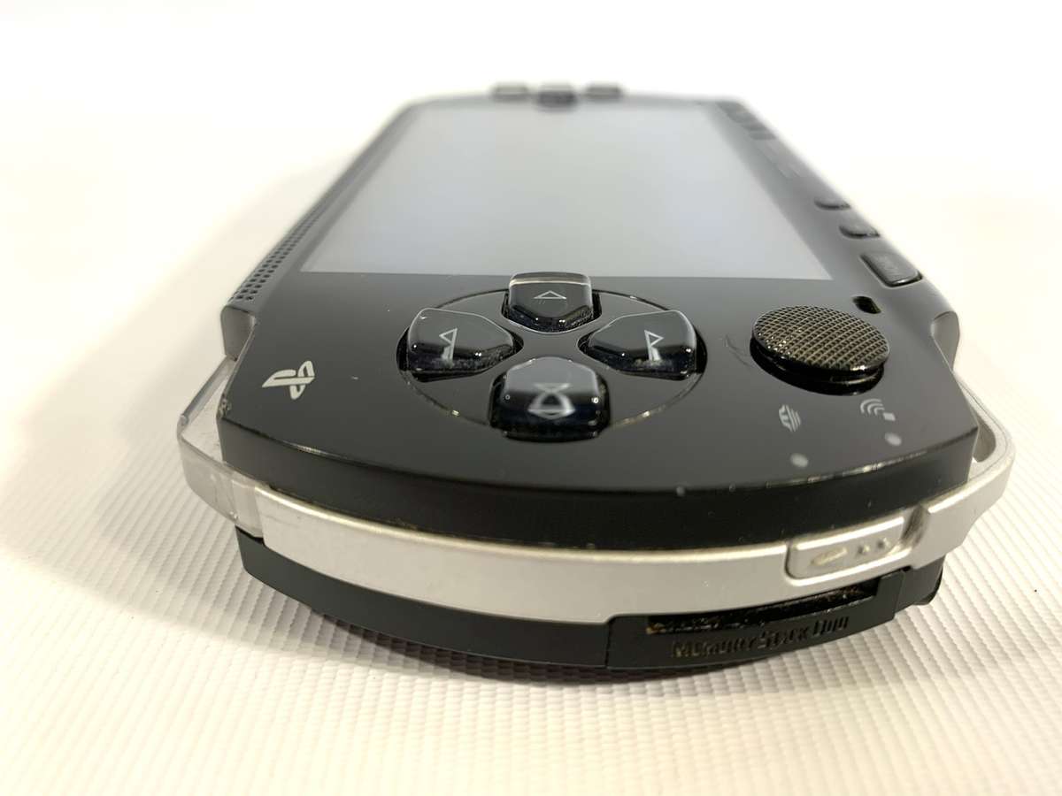 PSP 1004 (Works, but needs charger and battery)