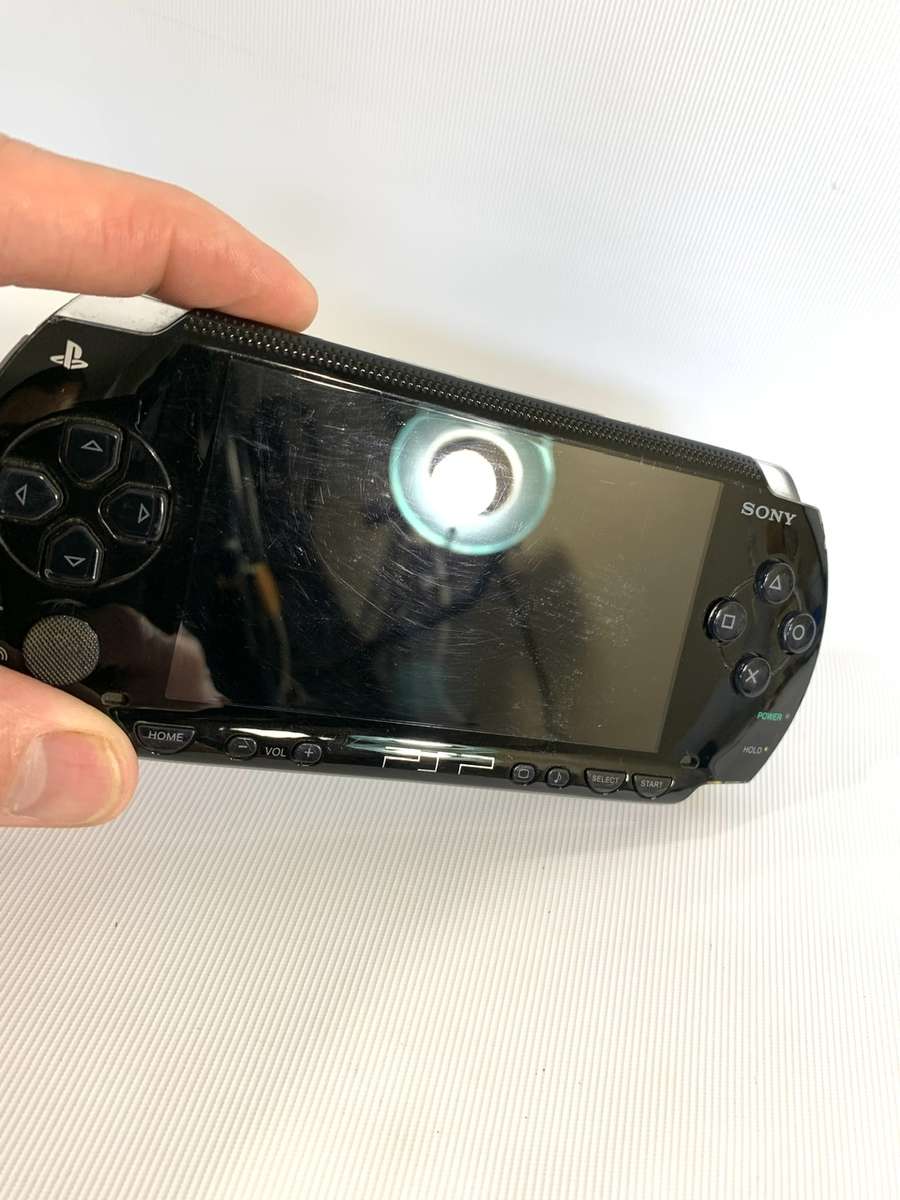 PSP 1004 (Works, but needs charger and battery)