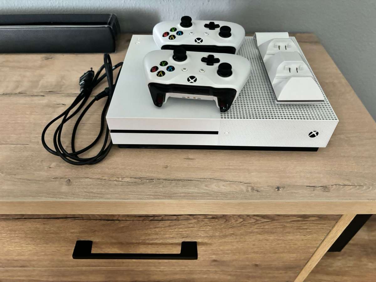 Xbox one consol with 2 remotes and wireless charger