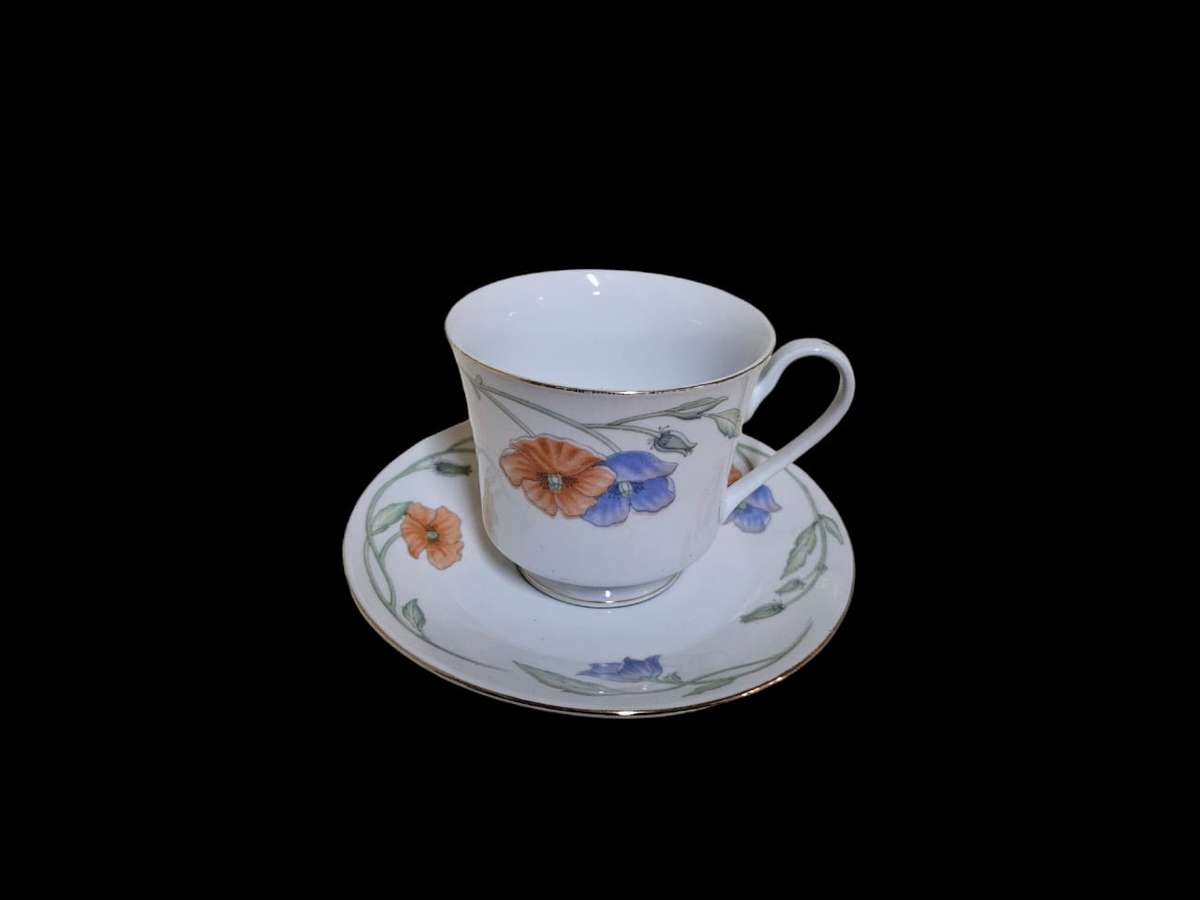 Porcelain floral tea cup due's