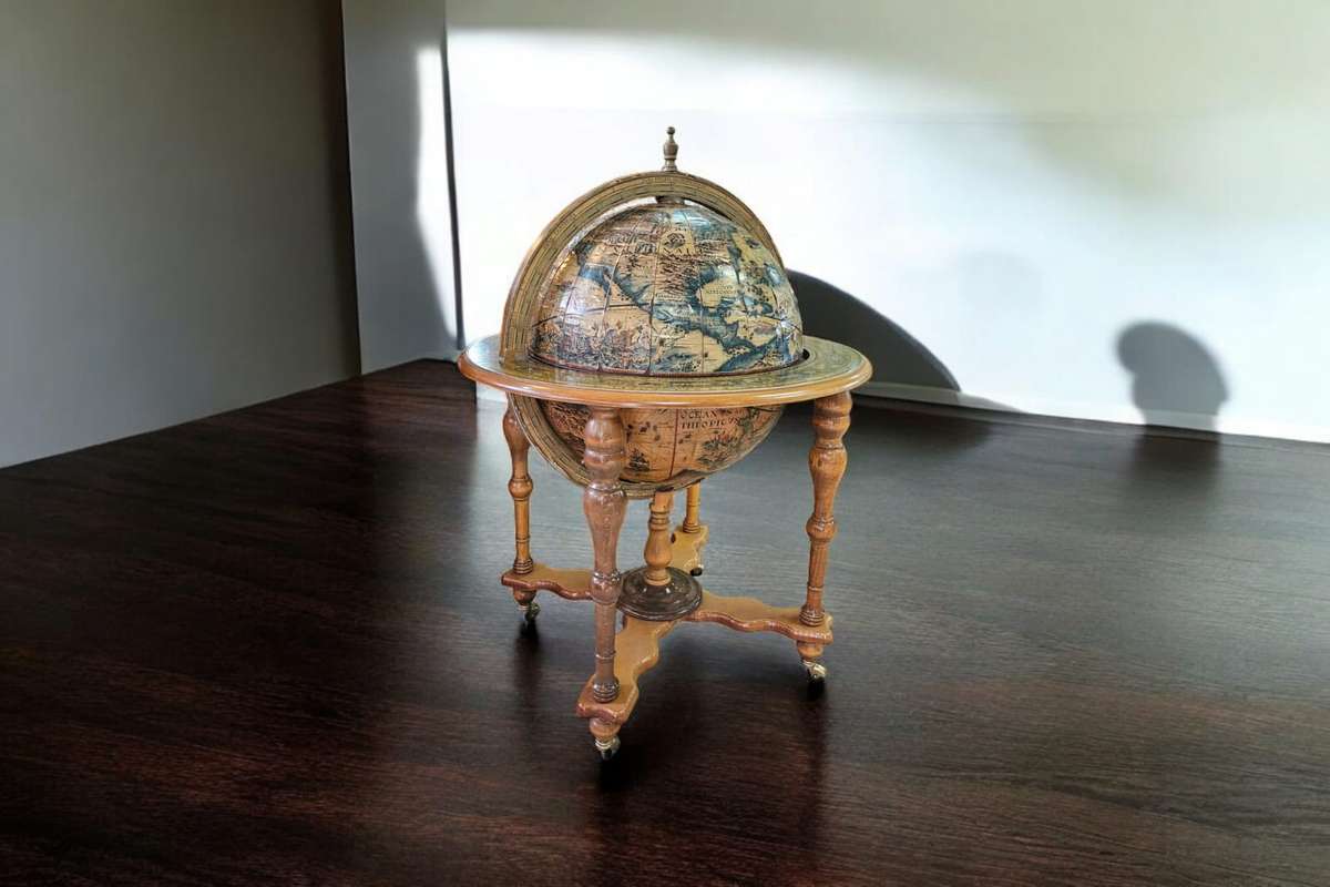 Timeless elegance of the 1960's Italian World Map Globe Bar Drinks Trolley