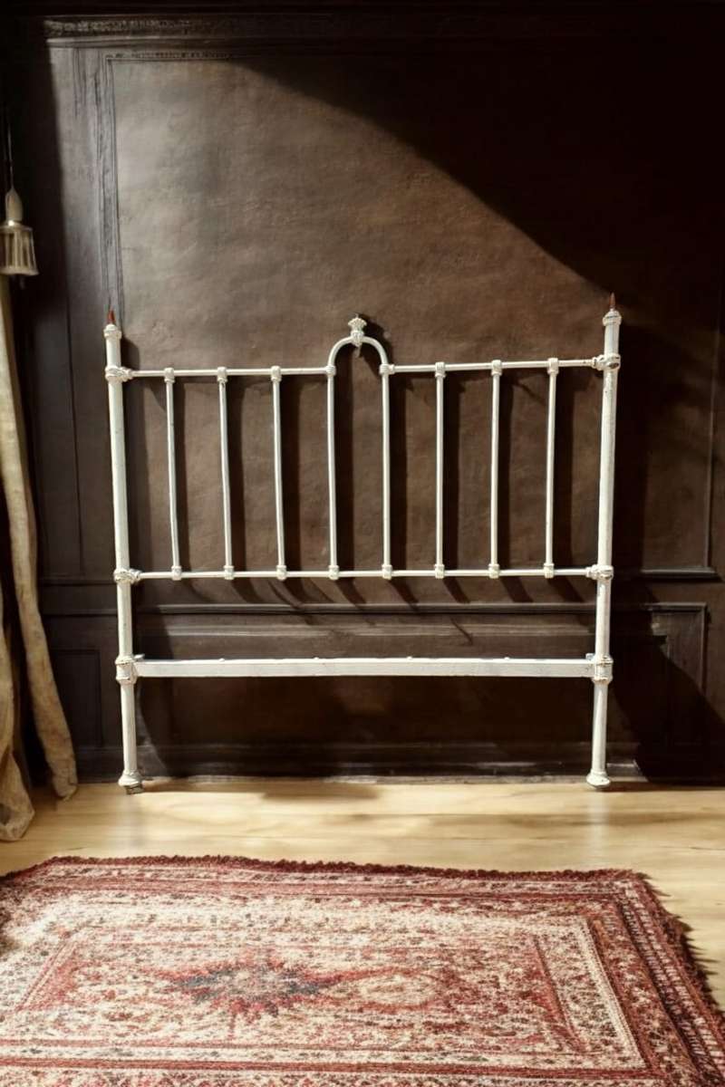 Discover timeless elegance with a Antique Cast Iron Headboard