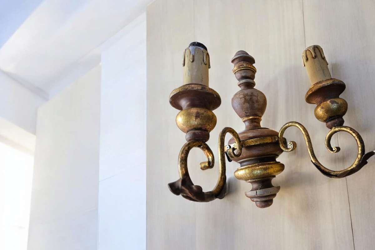 Illuminate your space with a touch of rustic elegance with our wooden and metal wall scone