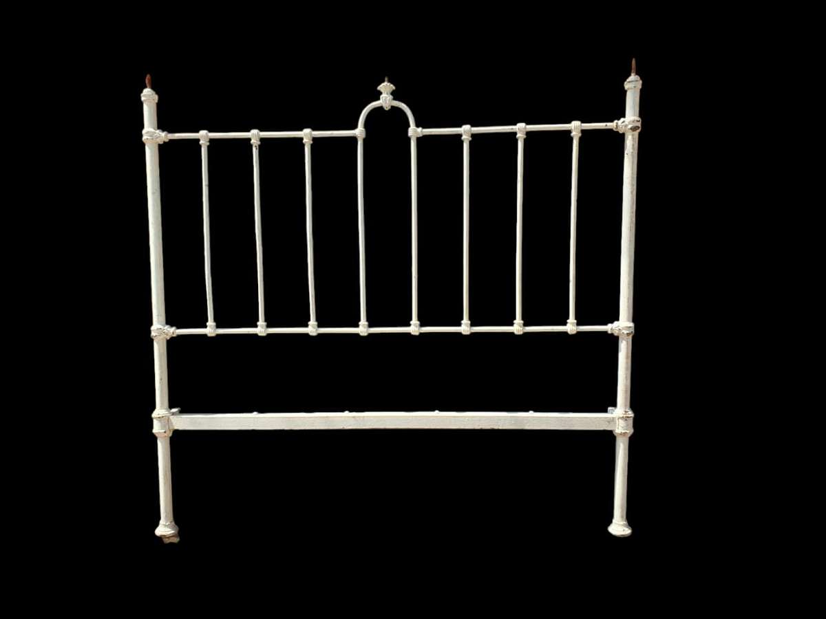 Discover timeless elegance with a Antique Cast Iron Headboard