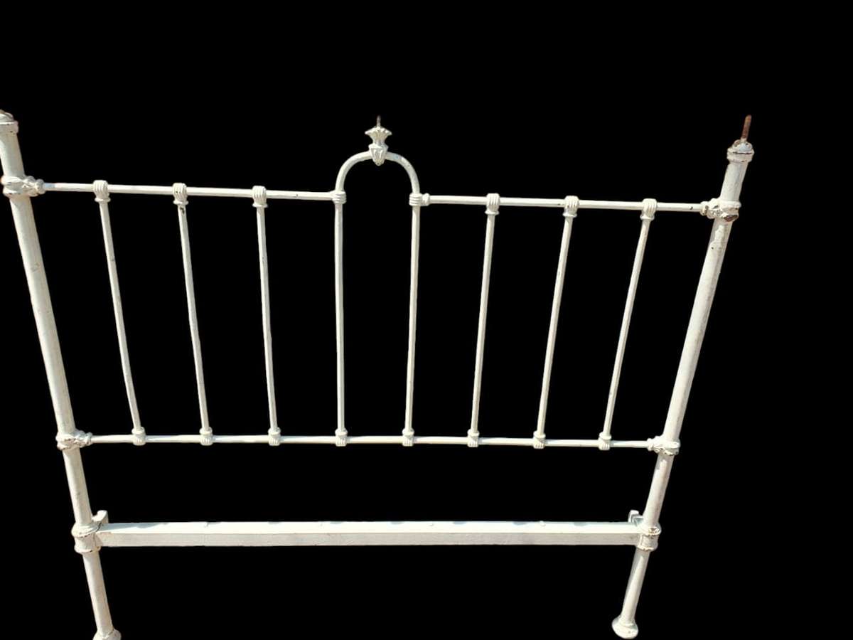 Discover timeless elegance with a Antique Cast Iron Headboard