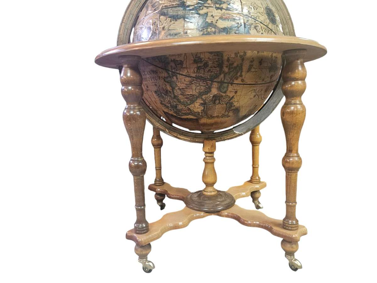 Timeless elegance of the 1960's Italian World Map Globe Bar Drinks Trolley