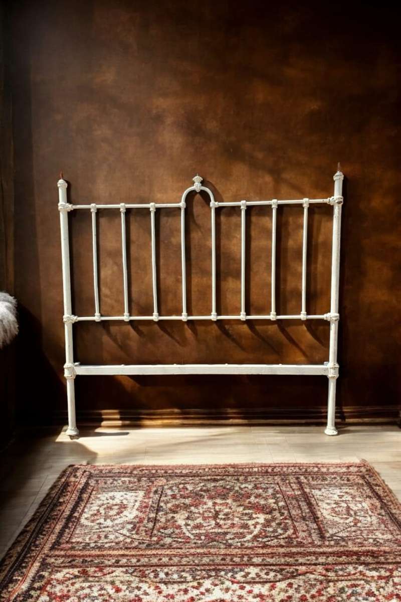 Discover timeless elegance with a Antique Cast Iron Headboard