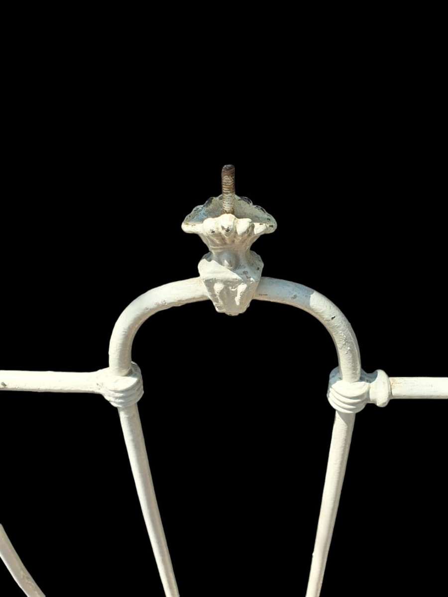 Discover timeless elegance with a Antique Cast Iron Headboard