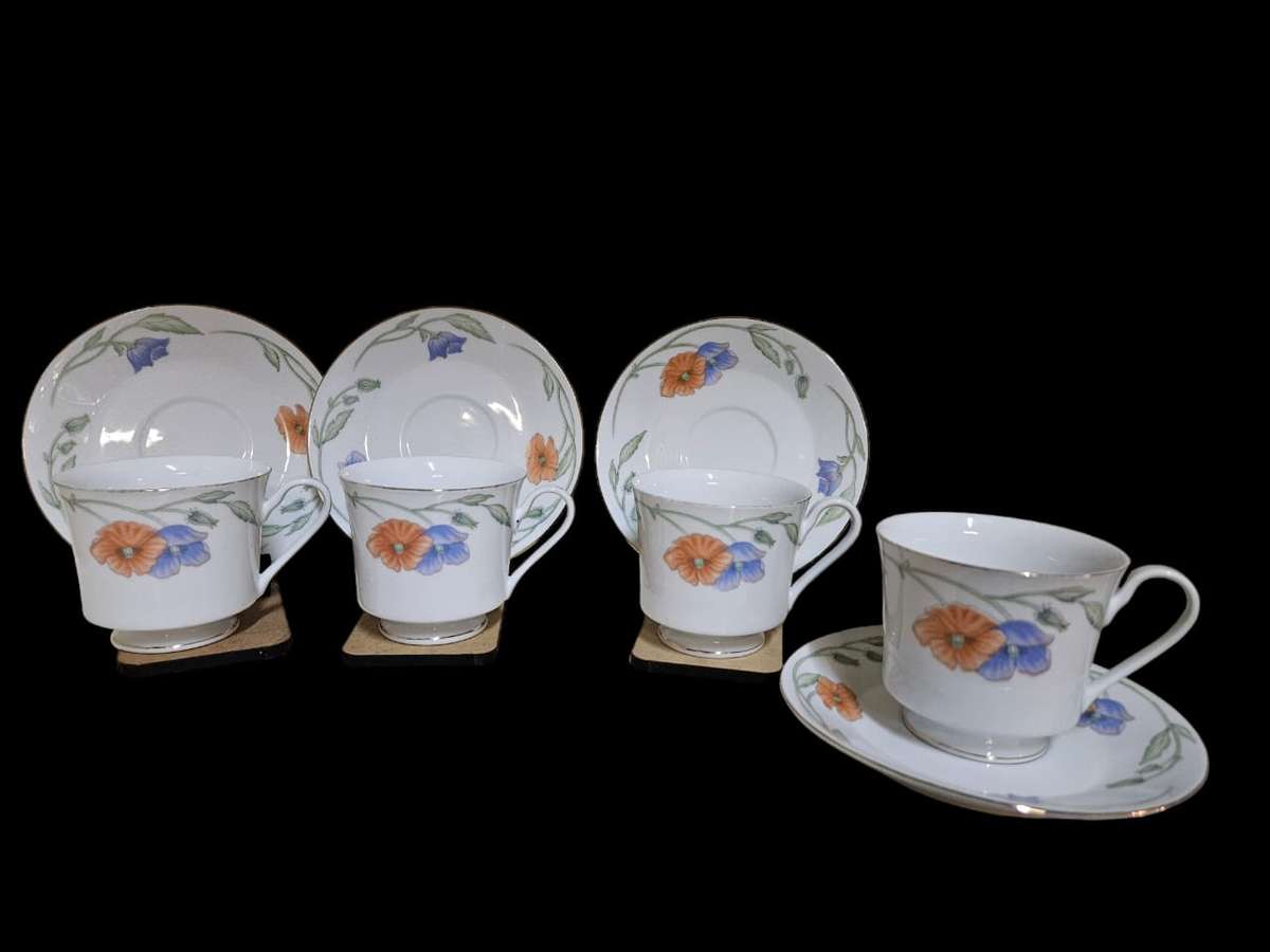 Porcelain floral tea cup due's