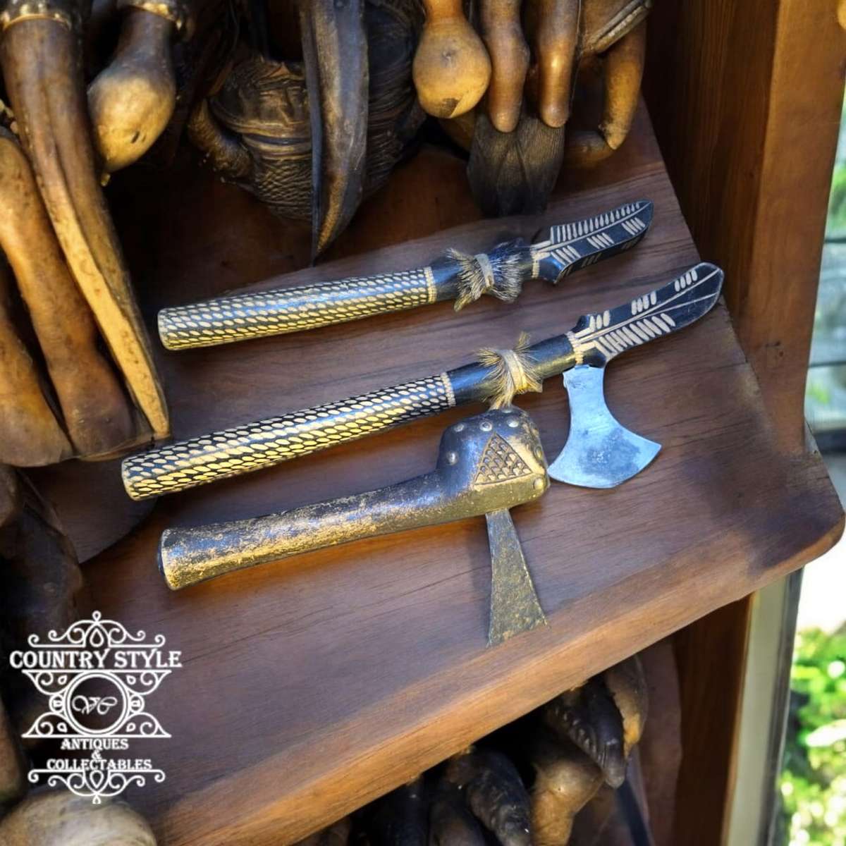 Modern recreation African wood & metal piece